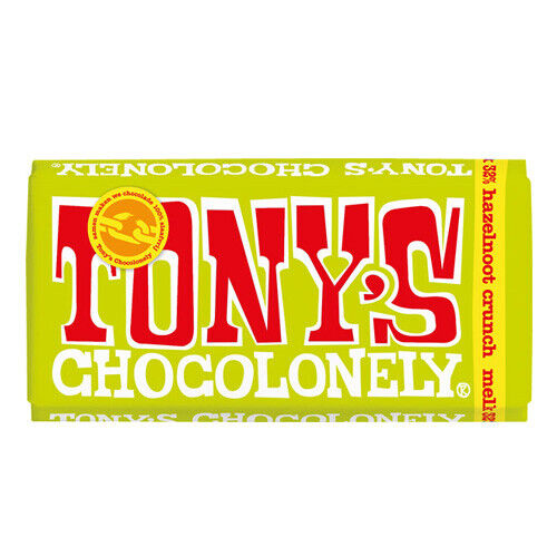 Tony's Chocolonely Milk Hazelnut Crunch 180g Belgijska czekolada mleczna z kawałkami orzechów laskowych, pastą z orzechów laskowych oraz kawałkami ciasteczek