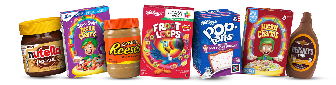 Produkty na słodkie śniadanie: nutella peanut, lucky charms berry, krem orzechowy reese's, płatki śniadaniowe froot loops, ciastka pop tarts, płatki lucky charms, syrop hershey's